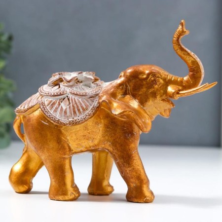 Polystone souvenir "African elephant with a flower on a blanket" under a bronze of 12.5x7x14 cm