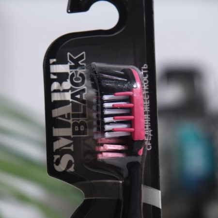 SPLL toothbrush Black of average stiffness,-1