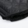 The coupling on the handle of the stroller, quilted, black color