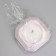 The candle "Square" in the candlestick with beveled corners is small, 9x3.5cm, marble with purple. stripes