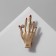 Brooch "Hand" with manicure, red-white color in gold