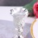A set of 2 candlesticks, 7.5 x 7.5 x 10 cm