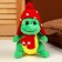 Soft toy "Dragosh", in a red hat, 15 cm, green color