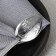 A teaspoon spoon with an engraving “Favorite Dad”, on a gift postcard, 3 x 14 cm.