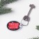 A keychain with an insert "mood", 5 x 4 cm.