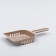 A scoop for cleaning a cat toilet, beige