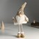 Interior doll "Santa Claus in a beige fur coat with a star on a cap" 19x12x45 cm
