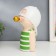 Polystone souvenir "Baby in a white baseball cap, with a gold bubble" Green strip 26x15x18 cm