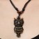 A pendant on the lace "Filin", the color is brown-black on a black lace, 80 cm