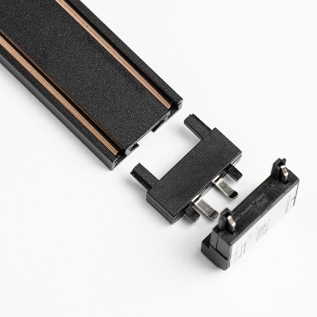 The ultra-thin connector for the busbar (ceiling-wall) is black 2.6x2.6x2.6 cm-3