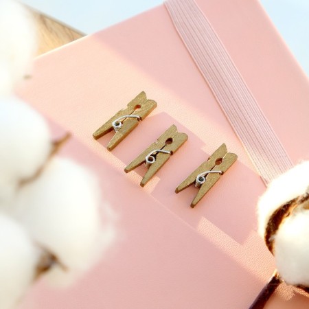 A set of decorative clothespins in dark gold, 50 pcs.