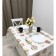 Milestock Meiwa Organdy 137 cm, roll 20 m, drawing "Beige circles"