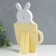 Photo frame plastic 10x15 cm "Bunny in a cup" yellow-white 6x20x33 cm