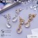 Earrings with rows "grace" a drop with a flower, color mix