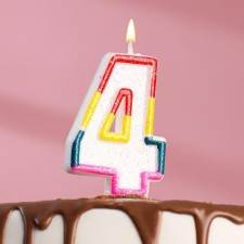 A candle for a cake with sparkles 