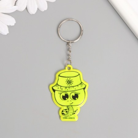 A plastic key a reflective “snake in a panama” 5.5x3.8 cm