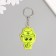 A plastic key a reflective “snake in a panama” 5.5x3.8 cm