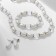 Set 3 objects: earrings, beads, bracelet "Pearls" alternation, white color in glass