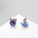 Earms with enamel "Monster" with horns, color pink blue