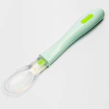 A spoon for nursery for feeding silicone, from 5 months, color mix