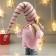 Interior doll "Girl in pink overalls and in pink cap" 49x8x14 cm