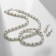 Set 3 objects: earrings, beads, bracelet "Pearls" twisted, white color in silver, 45 cm