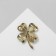 Druz's "Clover" brooch, the color is light green in gold