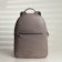 A backpack with a zipper, Textura, external pocket, gray-beige color