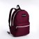 A backpack with a zipper, an outer pocket, burgundy color