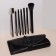A set of makeup brushes, 7 objects, a cover on the ties, the color is black
