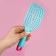 The comb is massage, wide, ventilated, 8 × 24.5 cm, color mix