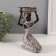 Summary for 1 candle "African with a dish on the head" White with black 12x12.3x19 cm