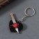 Acryl key a mirror "knife in the heart" 5.5x3.2x0.4 cm