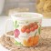 A circle container with a lid, 750 ml, 13.7 × 11.2 × 10.5 cm, decor, light-beige color