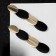 Earrings Metal "Trend" path of ovals, black color in glossy gold