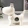 Souvenir ceramics "puppy in pars" white-black with gold 12.8x8.5x13.5 cm