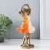 Polystone souvenir "Two sisters" bronze, orange-white 10.5x6.5x21.5 cm