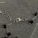 Beads "Zigzag" d = 0.6, black color in silver, 45 cm