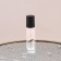 Glass bottle for perfume, with a roller, 10 ml, transparent/black color