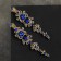Clips "openwork" drops with curls, white-blue color in gold