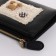 Women's wallet on the button, black color