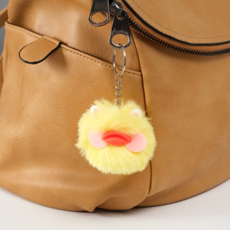 Fluffy on the ring "Unusual duckling" yellow 10x6x6 cm