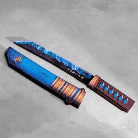 The souvenir is wooden "Tanto knife", in a scabbard, blue