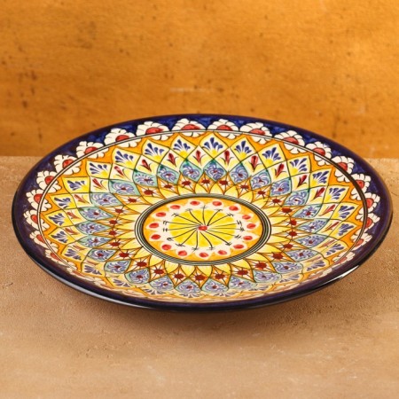 Plate of the Rishtan ceramics "Flowers", 26 cm, yellow blue