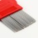 A set of 2 combs, with short and long teeth, red