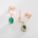 Earrings with rhinestones Xuping Universe, oval, green color in pink gold