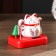 Plastic pendulum from the solar battery "Cat Mani-Neko with flowers" White 8x10x6 cm