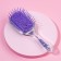 The comb is massage, wide, 6 × 18 cm, purple color