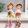 Souvenir Polystone "Boy/Girl with Fruits" Long legs mix 5.5x5x5x20 cm