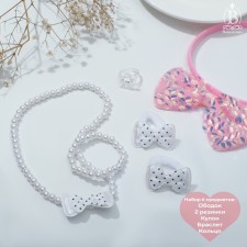 Set of children's “chosen” 6 objects: rim, 2 elastic bands, pendant, bracelet, ring, panda, bows, white-pink color